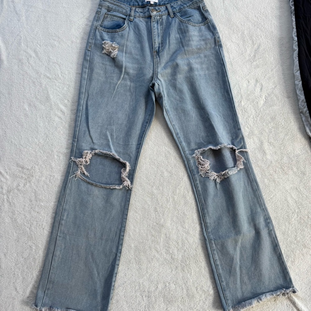 Distressed Blue Jeans
